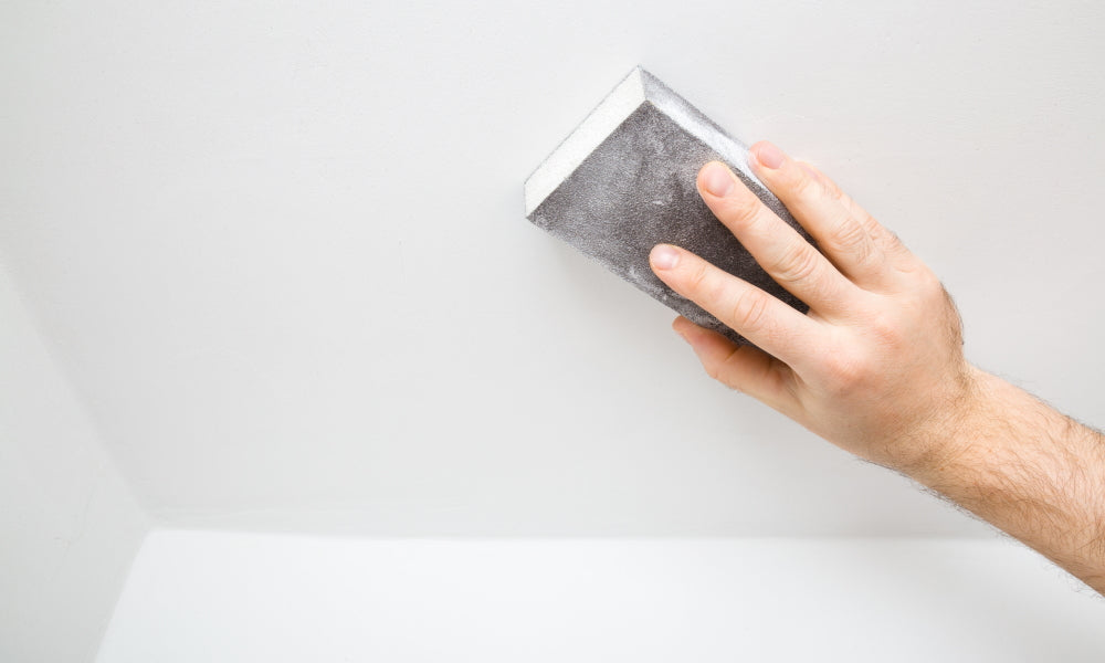 Learn how to use a sanding sponge on drywall surfaces for a smooth and