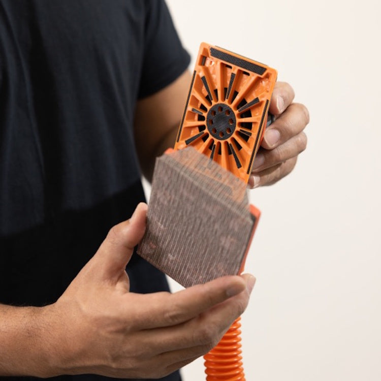 Attaching Full Circle MINI mesh abrasive sheet to Mini Flex Air drywall sander for dust-free finish with hook & loop backing