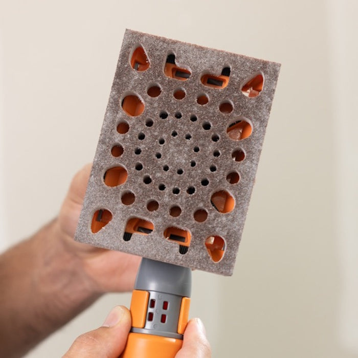 Close up of aluminum oxide grit on Full Circle Mini Flex Abrasive Sponge fine-grit surface for detail sanding