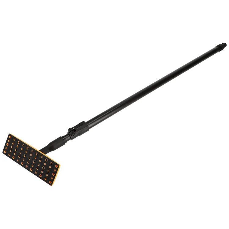 Mirka DecoSander rectangular pad angled to show vacuum hose holes — dust-free sanding setup