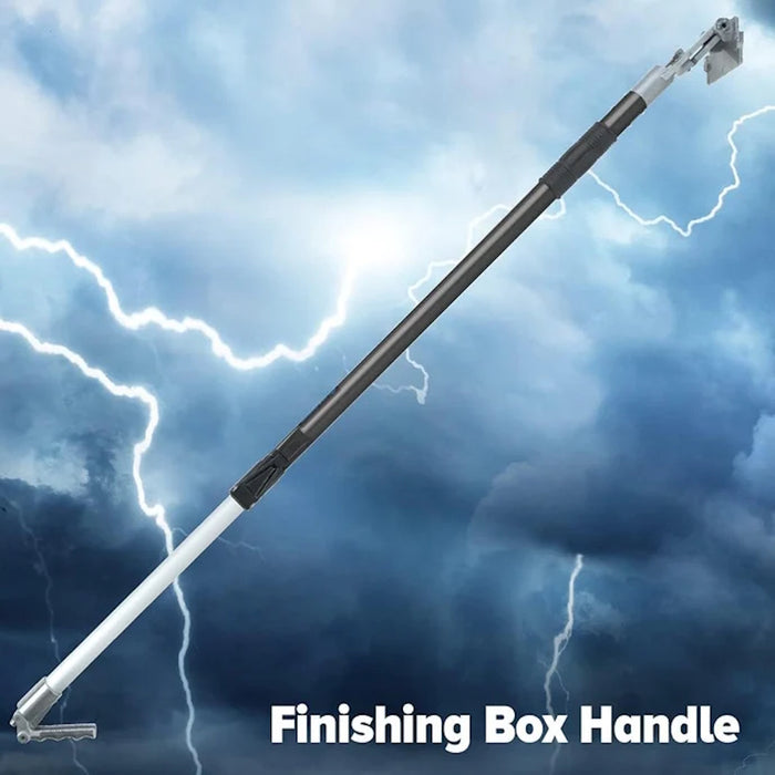 Finishing box handle against a dramatic sky with lightning