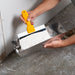 Renegade blue steel taping knife loading joint compound from drywall mud pan